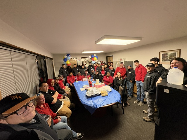 Washington Water Damage and Cleaning Services team celebration in the office
